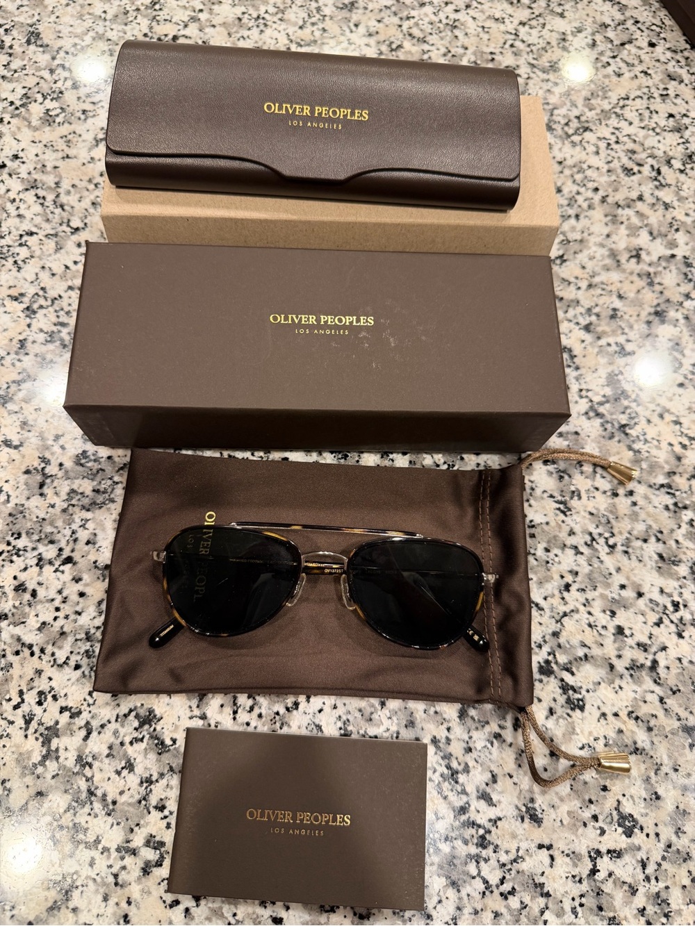 Oliver Peoples Men’s Tortoise & Gold Sunglasses with Dark Lenses